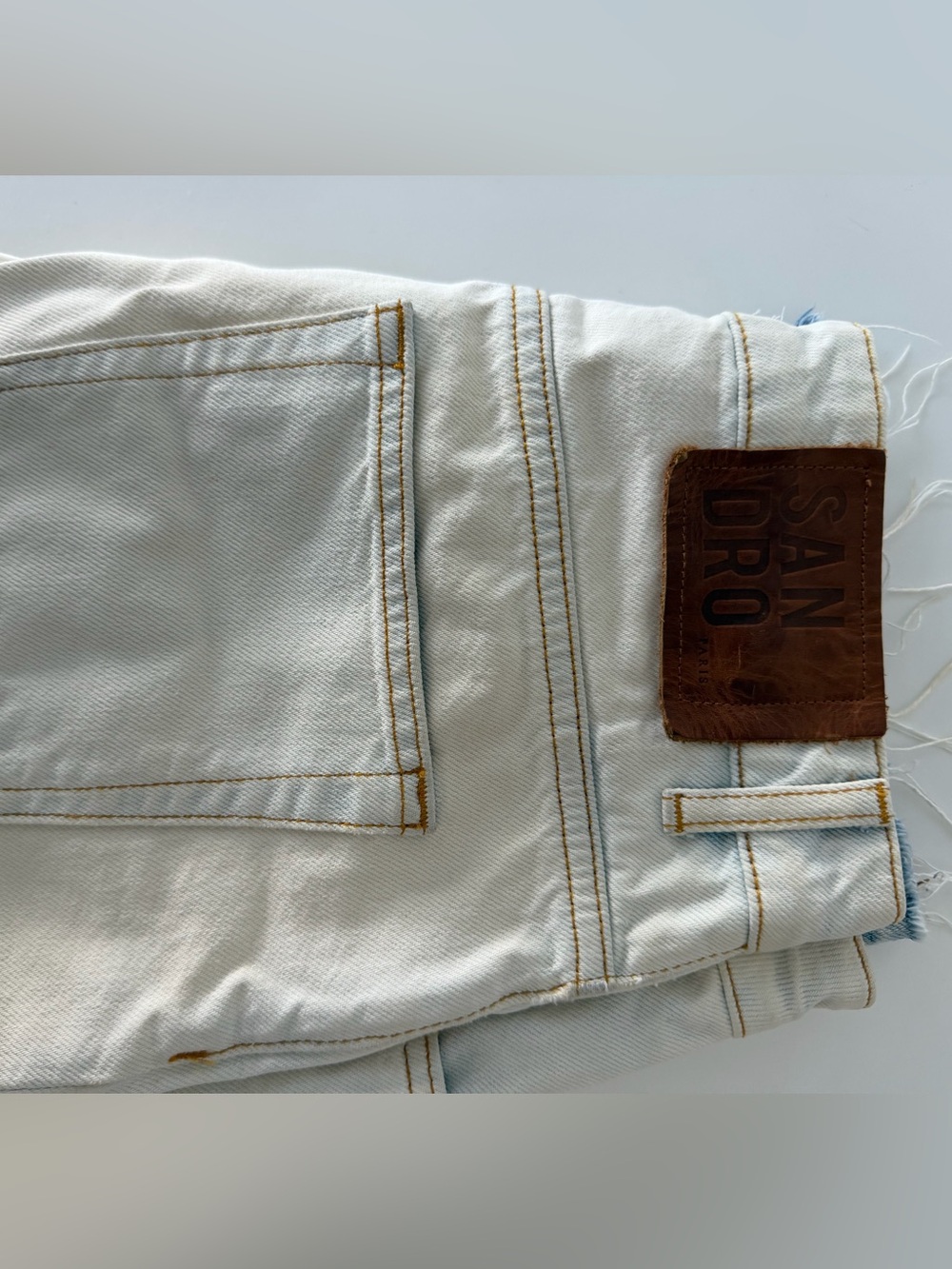 Sandro Light Blue Denim Jeans with Brown Leather Patch